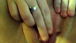 Playing with wet pussy while watching friend's horny porno