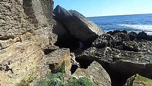 African Prostitute Shows Off Stunning Ass on Nudist Beach