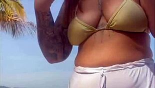 Oops, these shorts are showing my big pussy on the beach 😏