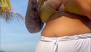 Oops, these shorts are showing my big pussy on the beach 😏