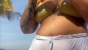 Oops, these shorts are showing my big pussy on the beach 😏