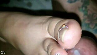 Wife masters an incredible toejob with a monster BBC while keeping it spicy