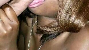 Ebony teen gives sexy blowjob to big cock