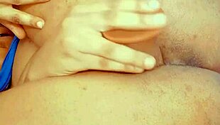 Hairy lesbian fingers her narrow ass, masturbates, and squirts in solo anal play.