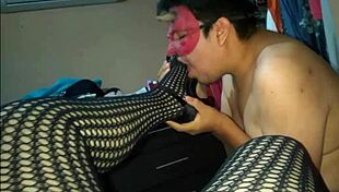 the fat bbw milf in fishnets gives a footjob to the prostitute while showing her big tits and ass