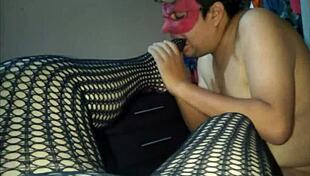 the fat bbw milf in fishnets gives a footjob to the prostitute while showing her big tits and ass