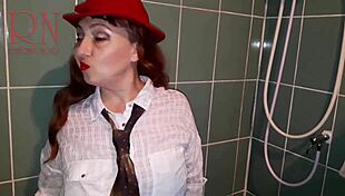 Hidden cam catches housewife in wet clothes under shower