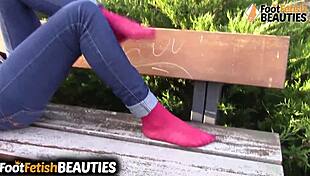 i can’t stop watching this brunette babe go barefoot in the park