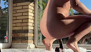 Struggling to take my first huge black dildo in my tight pussy backstage.