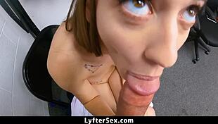 Teen bent over by guard in shop