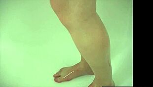 Sexy brunette takes a shower and masturbates by fingering her wet pussy using various toys