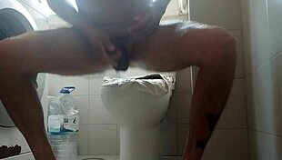 Feeling the rush as he shaves his big dick and spits out lots of milk.