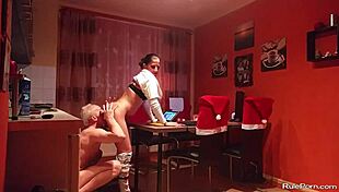 Intense couple engages in wild oral sex and licking in kitchen.