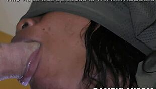 Ebony performer extracts thick substance orally