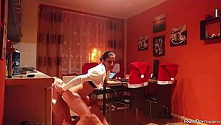 Intense couple engages in wild oral sex and licking in kitchen.