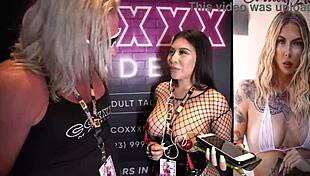 tokyo lynn chats at miami exxxotica 2022 with coxxx models. just dropped by to hear her story!