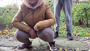 depraved curvy milf in leggings squats and pisses nearby