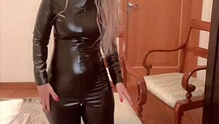 Oiled belly dancer performs in latex catsuit to domination music by Findom Goaldigger