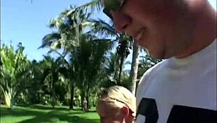 Blonde Coed Teases With Handjob On Beach