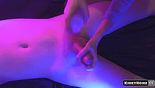 She gives a sensual handjob to his cock until he cums