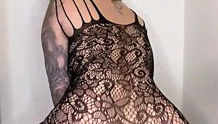 paige in fishnets takes a big black dildo and finishes with her mouth