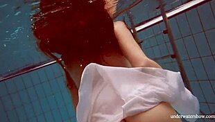 big natural tits babe lola swims underwater teasingly