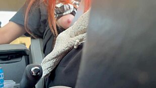 Artemisia Love flashes her big tits while driving, showcasing her long hair fetish.