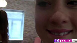 Russian brunette performs striptease in closeup video.