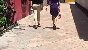 this rich cougar's ass is getting spied on in a voyeur scene