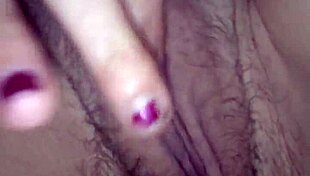 Katrina fingers her small tits!