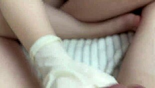 My Step Sister Gives A Handjob In Latex Gloves With Oil. It's So Kinky And Homemade.