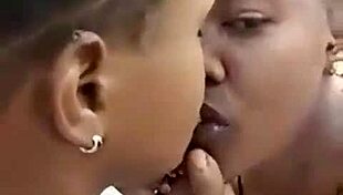 Two Liberian Lesbos Making Out Outdoors