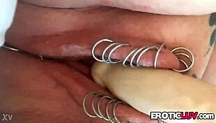 horny babe toys pierced pussy