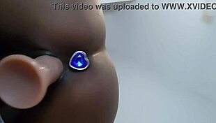 i play with my black dildo on bed