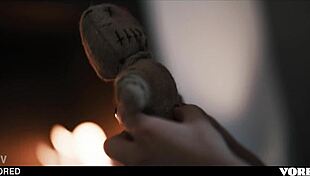 I saw girls havin fun with a voodoo doll, and one ends up slidin it all the way up in her pussy.