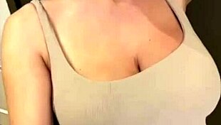 My stepmom flaunts her elastic ass and huge milky tits while I watch in awe. She teases with every move.