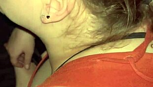 Redhead tattooed girl plays with monster toy suggestively