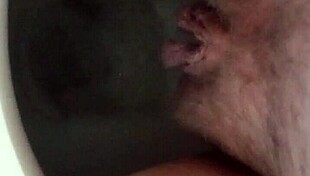 i'm so turned on by this pregnant lady's big swollen pussy, it's huge!