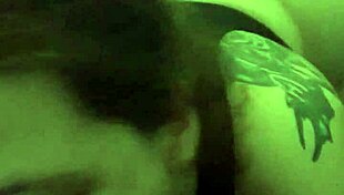 Redhead tattooed girl plays with monster toy suggestively