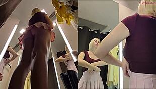 Hidden cam captures upskirt views of big tits and pussy in fitting room.