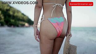 Hey, isn't this sexy Asian in a bikini walking on the beach just mesmerizing?