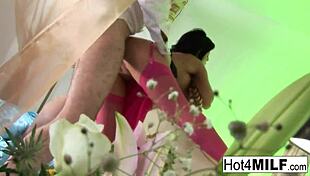 Busty brunette seduces him in pink lingerie and stockings 😏