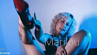 Gorgeous Marilou worships feet and masturbates with the queen.