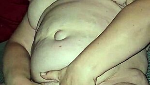 watch this milf flicking her bean until she cums hard