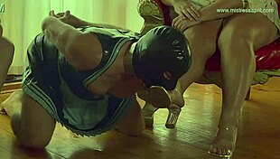 Dominatrix Mistress April humiliates bound slave with toys, dildo fucking, and squirting bondage