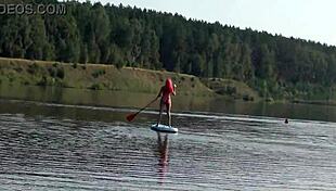 Tall skinny girl flashes her small tits in pink micro bikini at the beach
