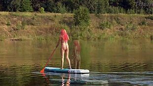 Tall skinny girl flashes her small tits in pink micro bikini at the beach