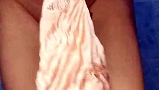 i can't stop watching this lingerie model dance with her dildo.