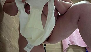 Mature bbw pisses on pussy in white panties at pool from below