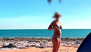 Wifey flashes her tits in bikini at the beach for exhibitionist fun
